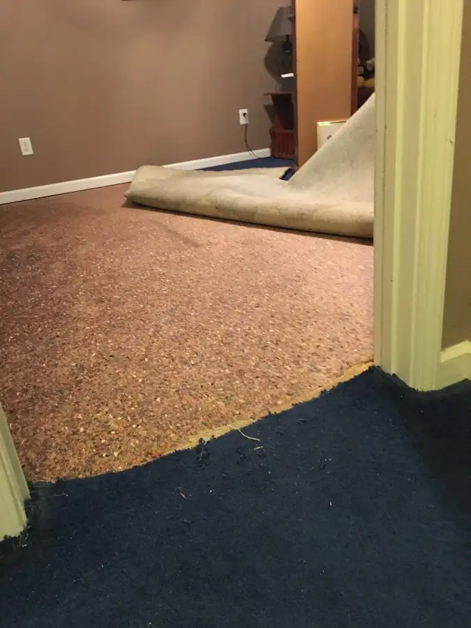 Carpet pad removal revealing water damage during Drying & Dehumidification in Selah